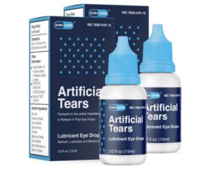 Ezricare artificial tears eyedrops - two bottles standing by two boxes